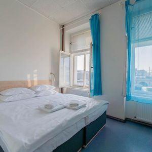 Kamer met een Queen Size Bed